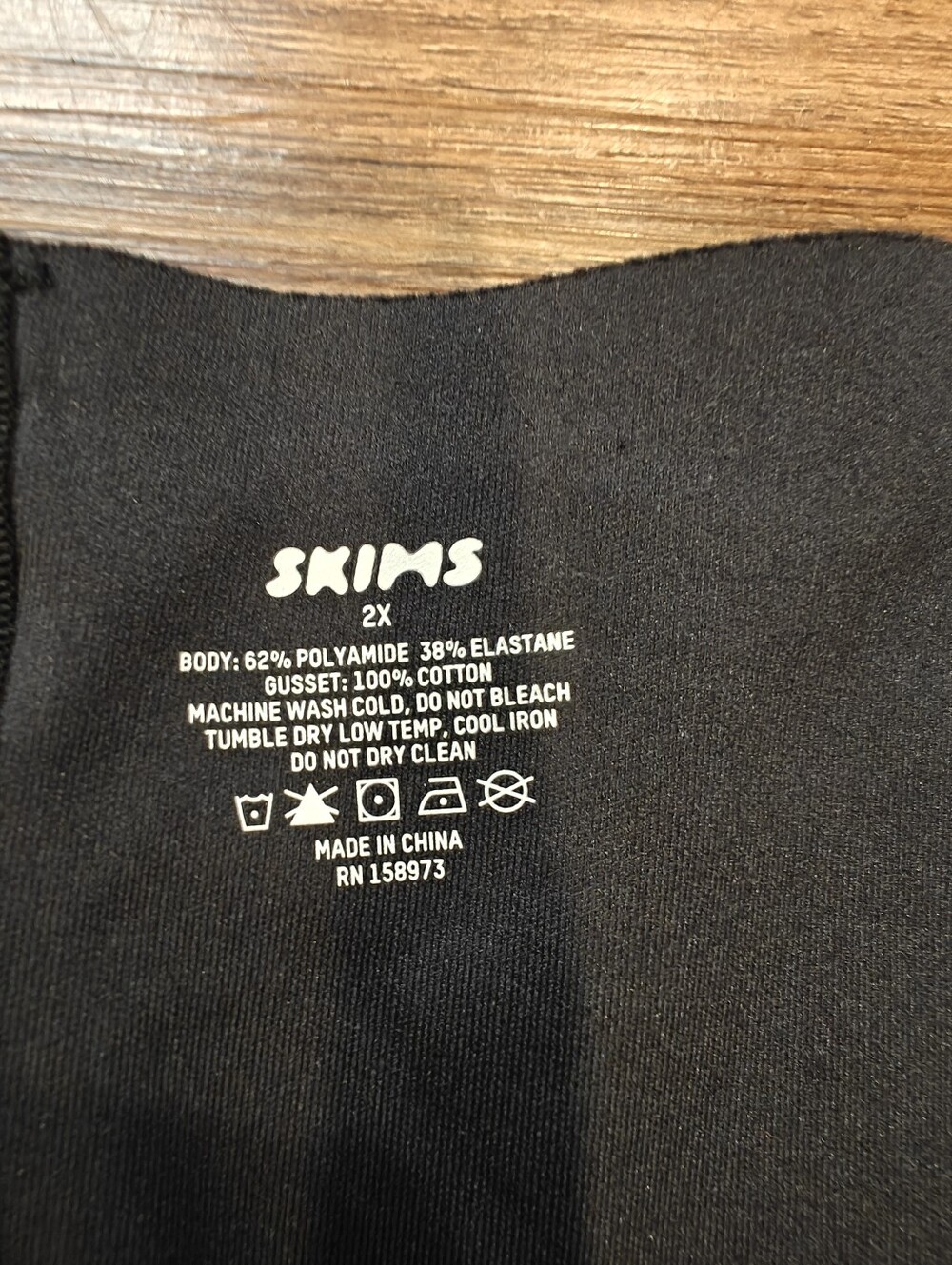 SKIMS Black Body Long Sleeve Slip Dress - Picture 2 of 12